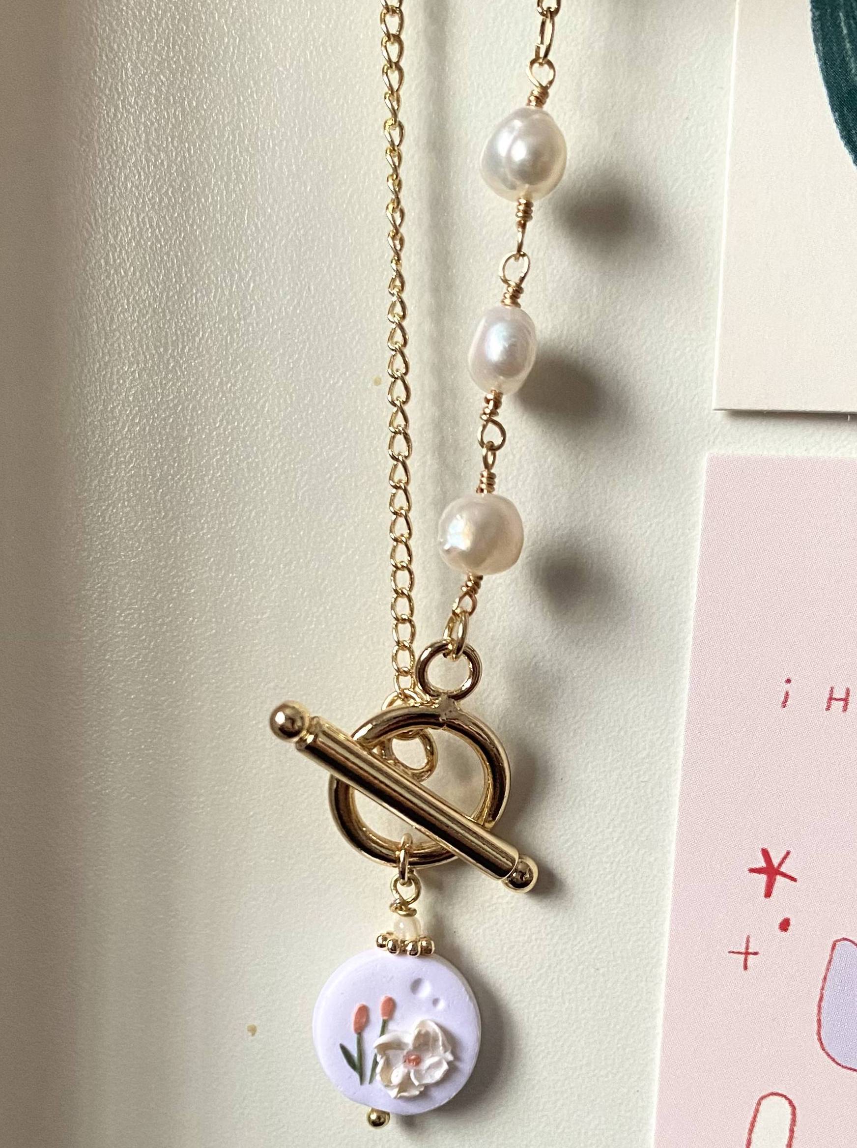 wire-wrapped pearls, 14k gold chain, polymer clay charm, magnolia design